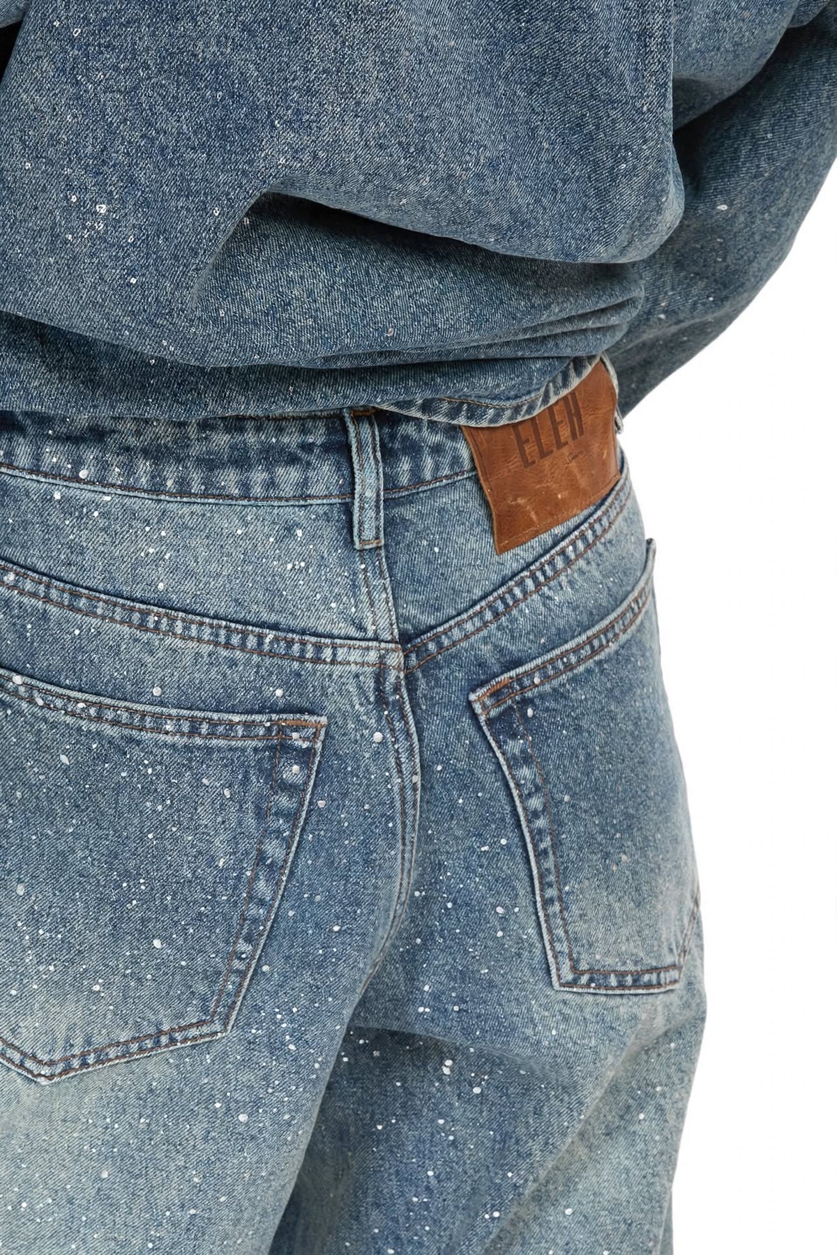 Niebieskie jeansy wide leg ELEH ze srebrnymi plamkami